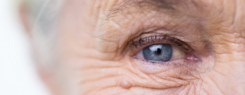 older woman blue eye close up