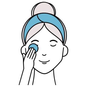 person removing makeup