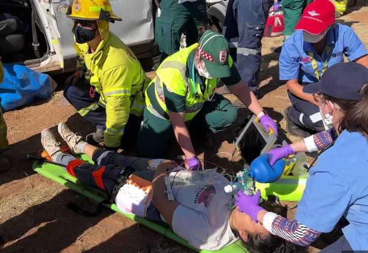 paramedics attending an emergency situation
